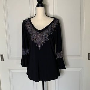 Women’s  black, v neck, 3/4 length sleeve shirt  with beaded detail.